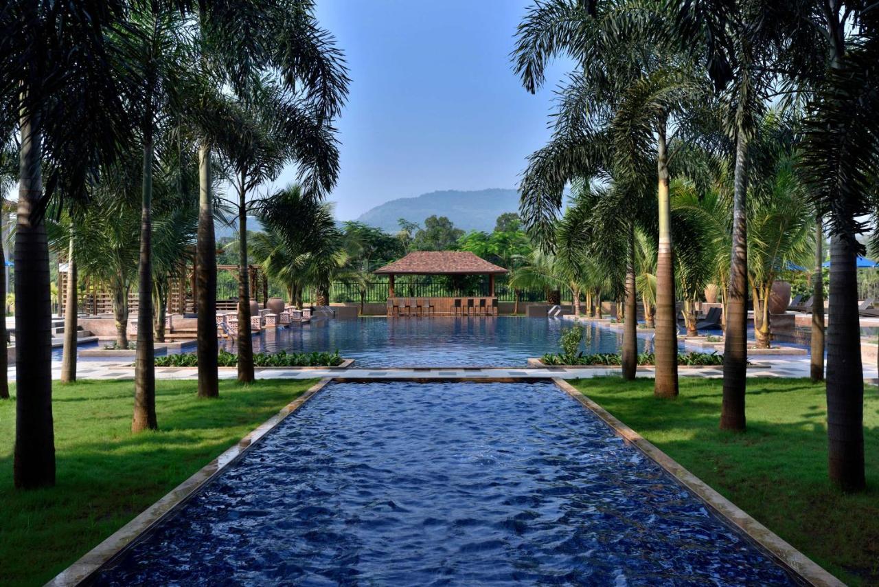 Radisson Blu Plaza Resort & Convention Centre Karjat Kültér fotó The pool at the Anantara Golden Triangle Resort