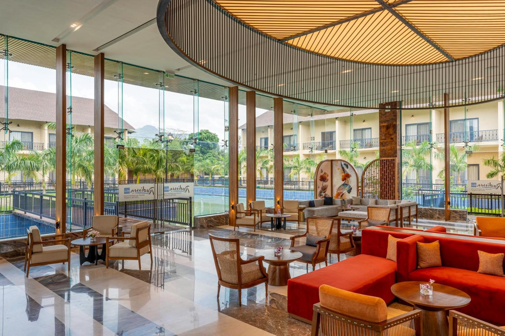 Radisson Blu Plaza Resort & Convention Centre Karjat Kültér fotó The lobby of the hotel